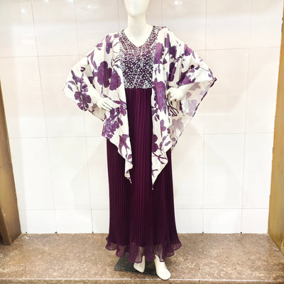 a purple  and white floral dress with a matching cardigan  