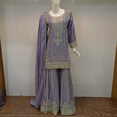 Short kameez sharara in lavender with intricate dull rose embroidery.