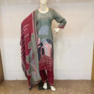 Grey and maroon straight suit with digital prints and hand-touch detailing, paired with matching pants and dupatta