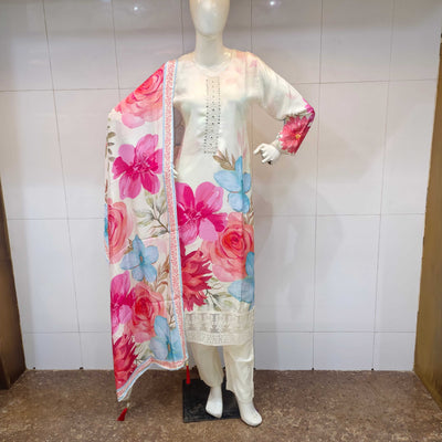 White straight suit with digitally printed floral pink and blue musleen cotton fabric and matching pants