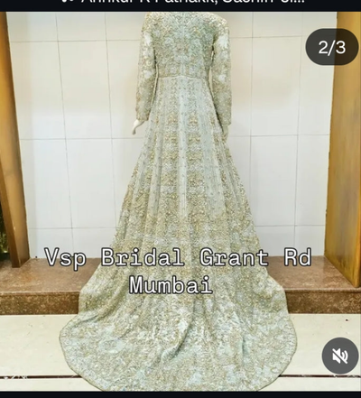 dusty mint Green embroidered bridal tail gown  with heavy hand work