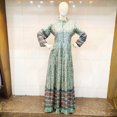 a floral dress with a patterned long-sleeve and delicate sequence butti
