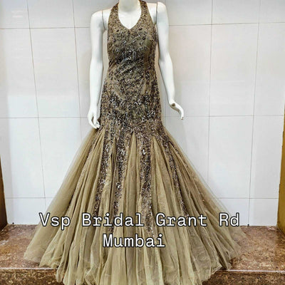 Fish tail gown with delicate handwork for bridal season.