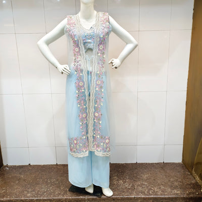  a light blue outfit with floral hand work embroidery