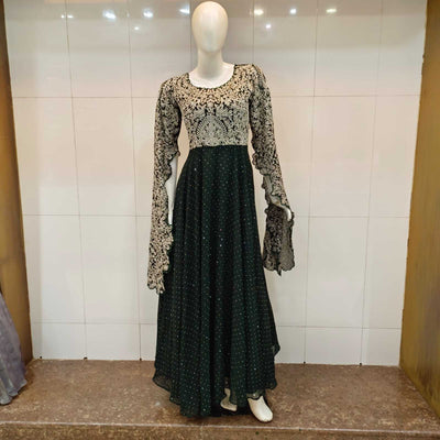 Gown with caterpillar sleeves having delicate embroidery