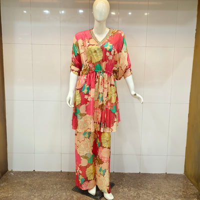a colorful floral coord set with V neck hand work 