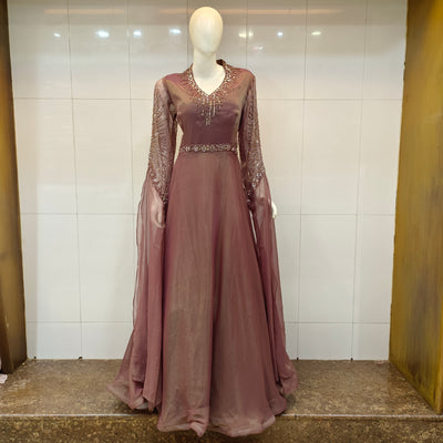 Mauve evening gown with sheer sleeves